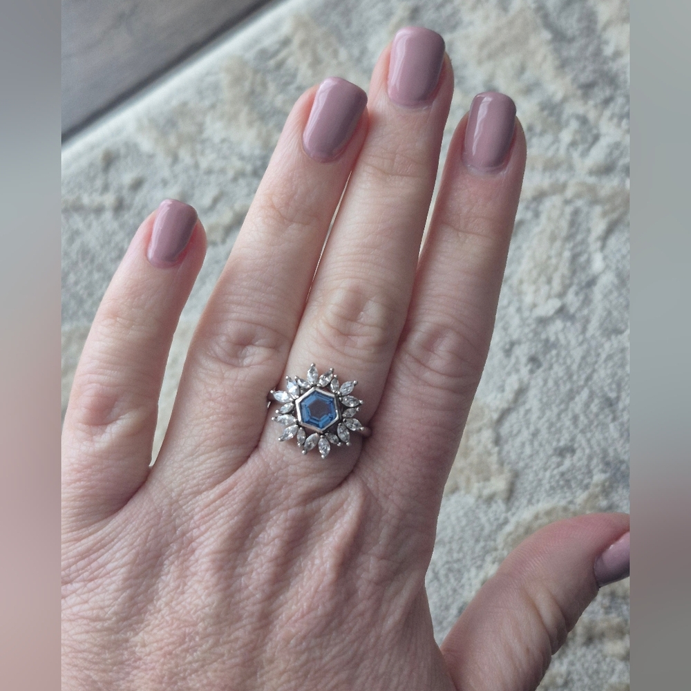 Dazzling Silver Ring with Blue Accent